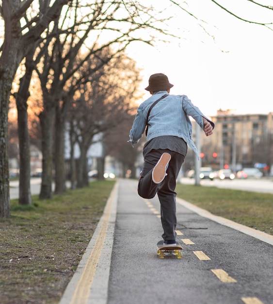 Teenage boy with skateboard