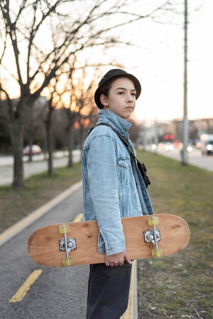 Teenage boy with skateboard