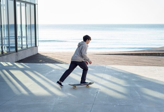 Teenage boy with skateboard