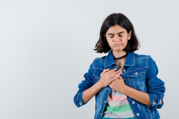 The teenage girl is feeling heartache on white background