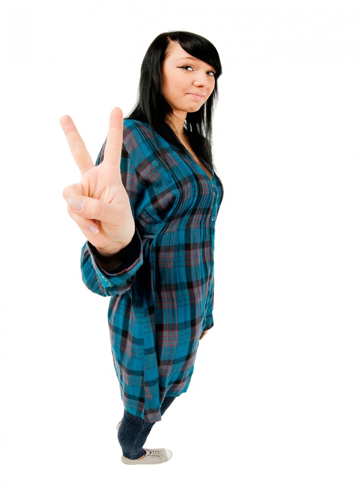 免費 Photo 一位十幾歲的女孩露出兩隻手指