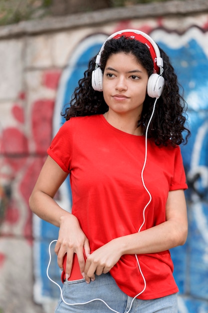 Teenage girl wearing headphones