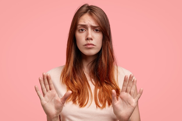 Teenage girl wearing pink T-shirt