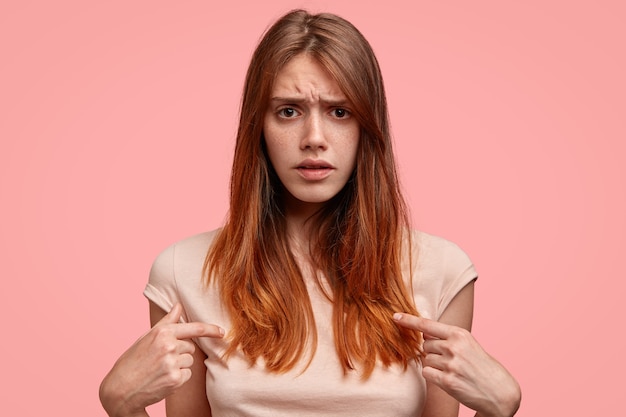 Teenage girl wearing pink T-shirt