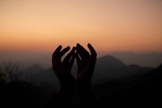 Teenage girl with praying. Peace, hope, dreams concept.