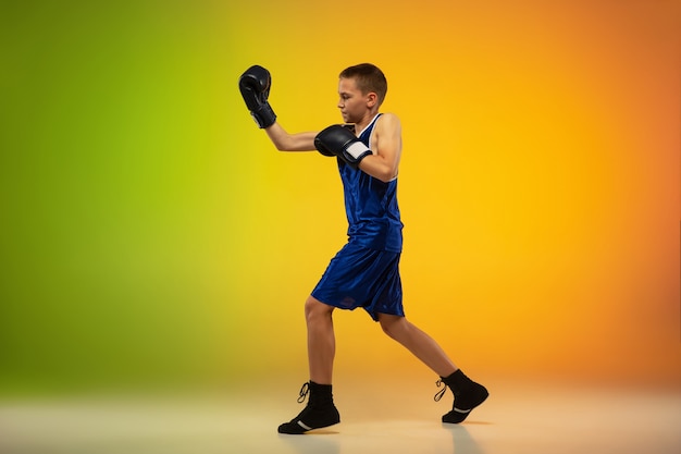 Free photo teenage professional boxer training