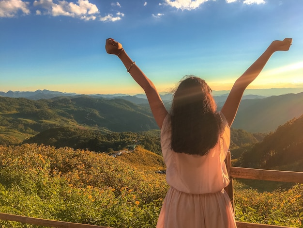 Free photo teenage relax at mexican sunflower field