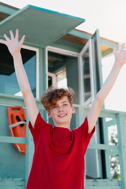 Teenager boy having fun in the summer