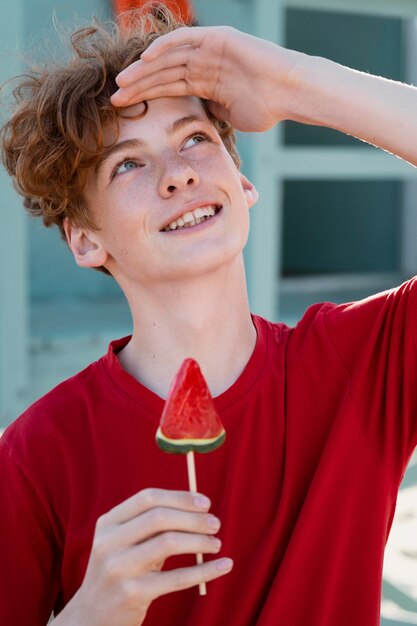 Teenager boy having fun in the summer