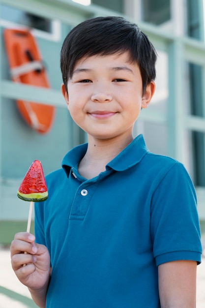 Free photo teenager boy having fun in the summer