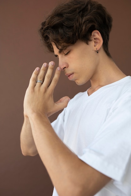 Teenager boy in stylish clothes posing