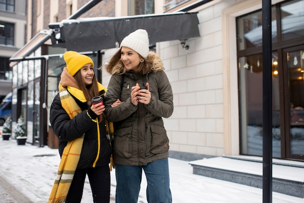 Teenager friends having fun in winter time