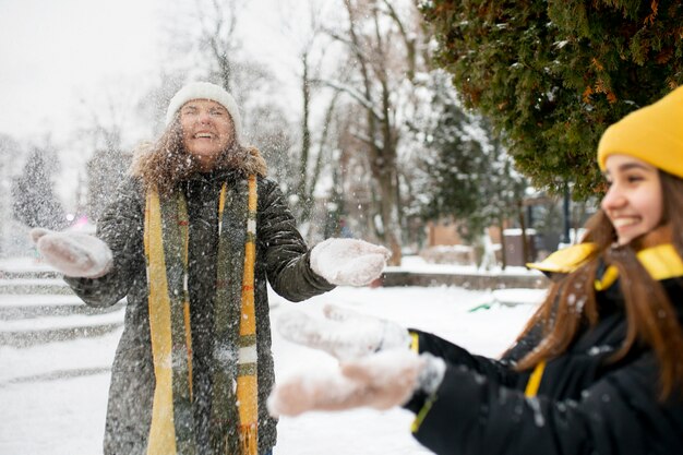 Teenager friends having fun in winter time