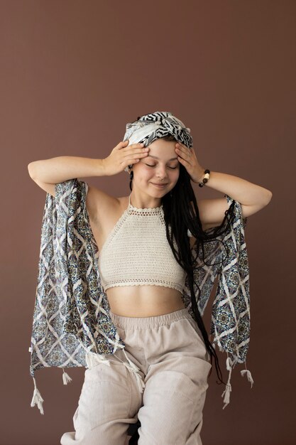 Teenager girl with hippie clothes and dreadlocks