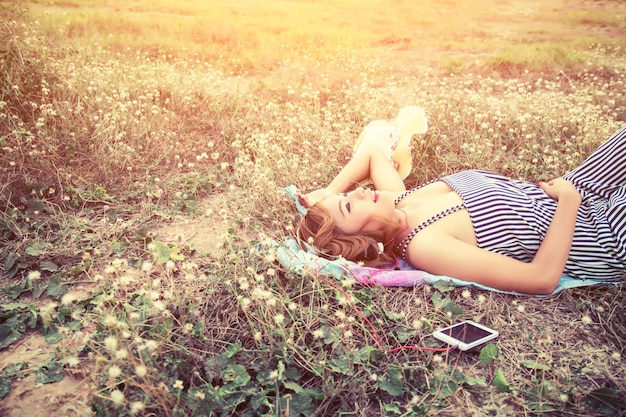 Free photo teenager resting at sunset