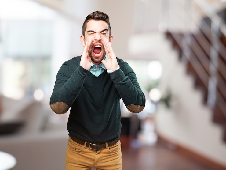 Free Photo teenager shouting with blurred background
