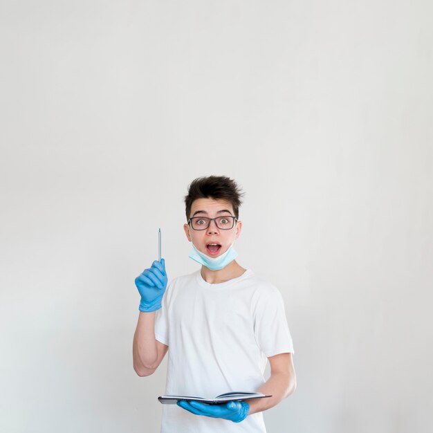 Teenager with clipboard