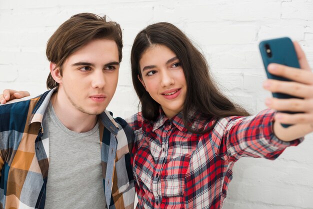 teenagers taking a selfie