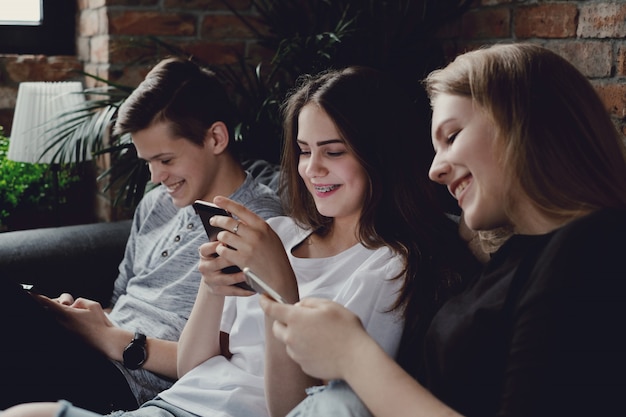 Teenagers using mobile phones using mobile phones