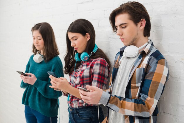 Teenagers using smartphone