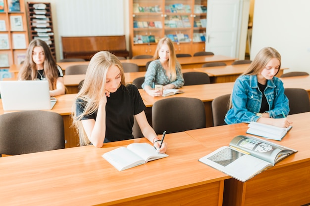 Teens studying in classroom