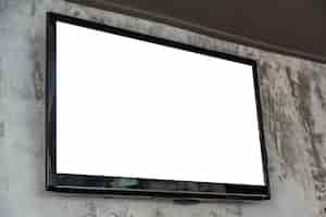 Free photo television with blank screen on the wall