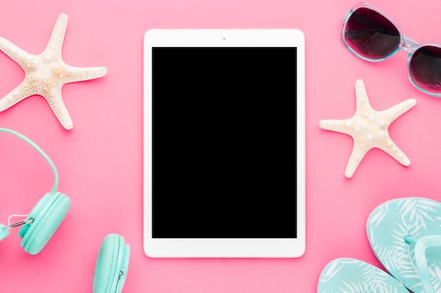 Free Photo template for inscription and beach accessories on colored background