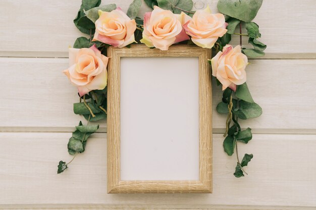 Template with frame and flowers with leaves