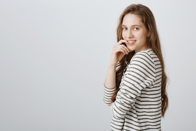 Tempting sassy and flirty girl smiling