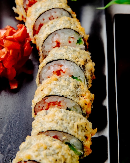 Tempura maki with chicken and avocado side view