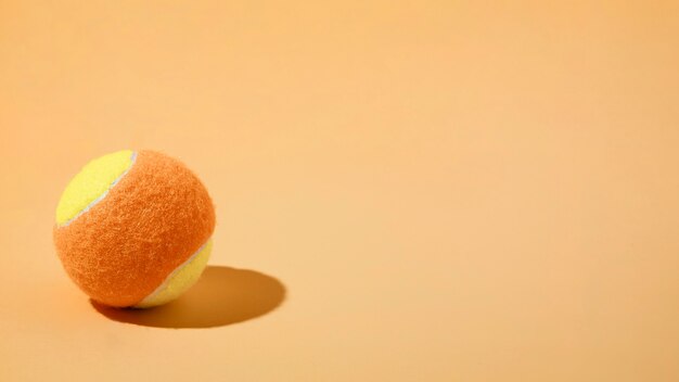 Tennis ball minimal still life with copy-space