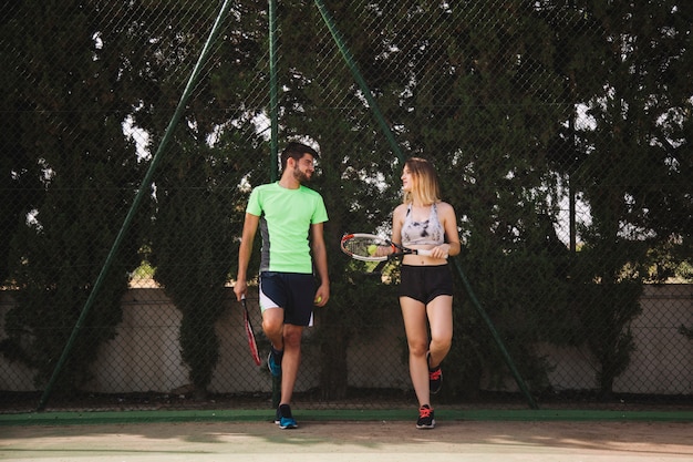 Tennis couple taking a break