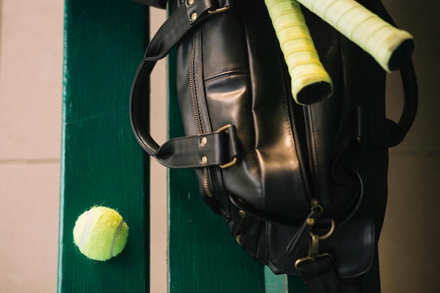 Tennis equipment bag on a bench