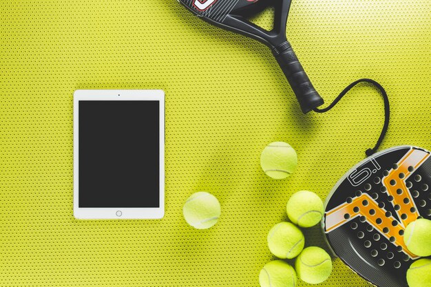 Tennis equipment near tablet