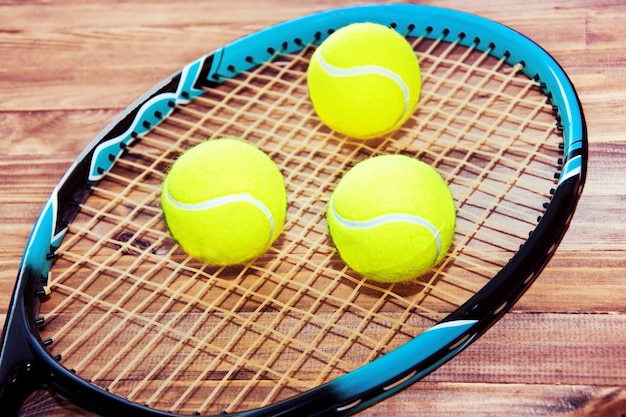 Tennis game. Tennis balls and racket.