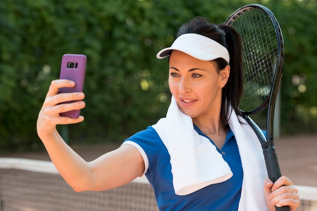 Tennis player with her racket