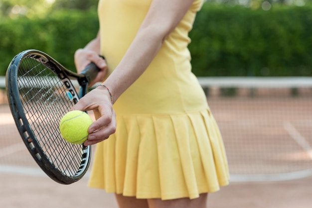 Tennis player with her racket