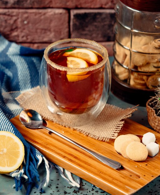 Tequilla shot served with salt and lemon slices