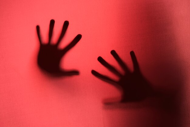 terrifying hands silhouettes in studio