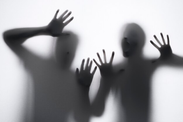 terrifying hands silhouettes in studio