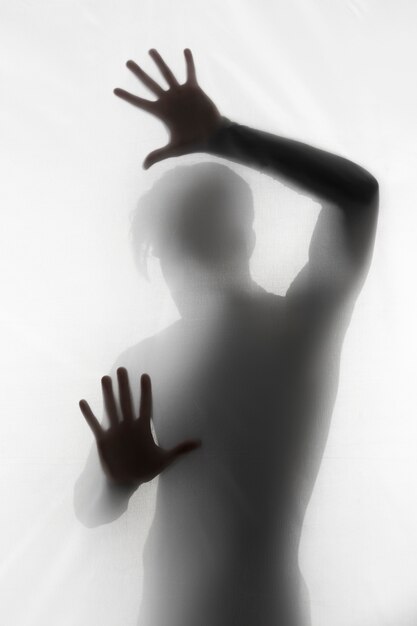 Terrifying hands silhouettes in studio
