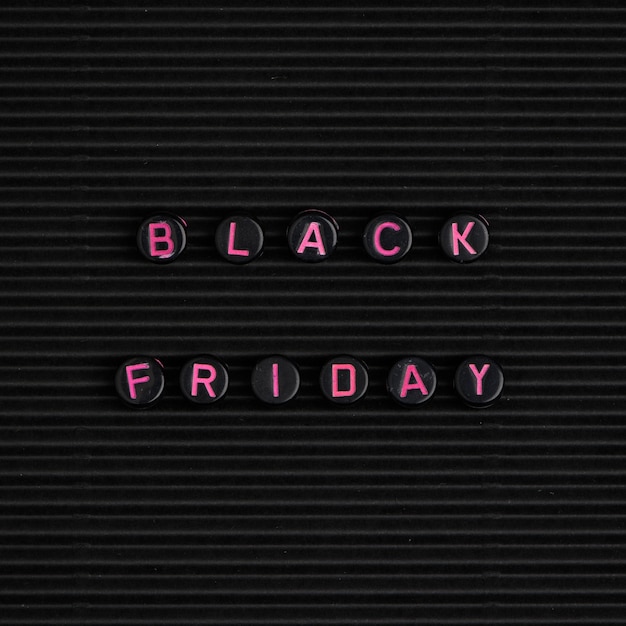 Free Photo text with beads: black friday
