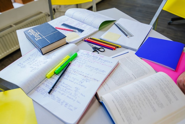 Free photo textbooks and notepads on table