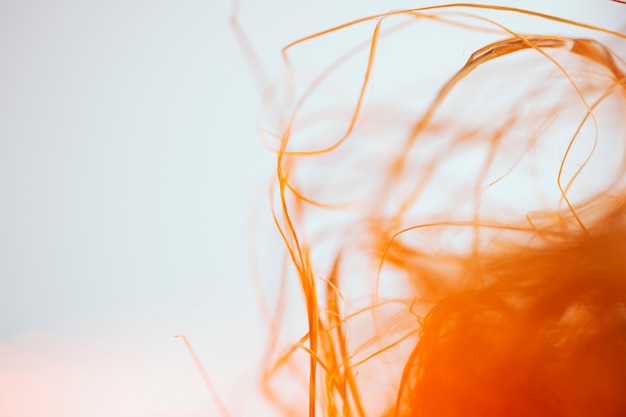 Texture of abstract waving orange fibers 