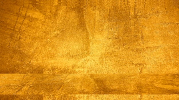 Texture of golden decorative plaster or concrete abstract grunge background for design