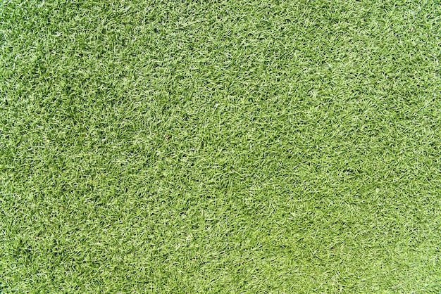 草の質感。緑色の背景。