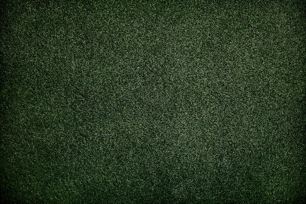 テクスチャ緑の草の表面の壁紙の概念