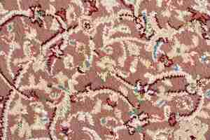 Бесплатное фото Текстура сложного цветочного узора короткого ковра