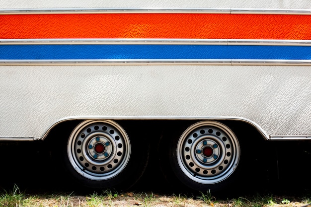 Texture of a van vehicle with horizontal lines ans wheels