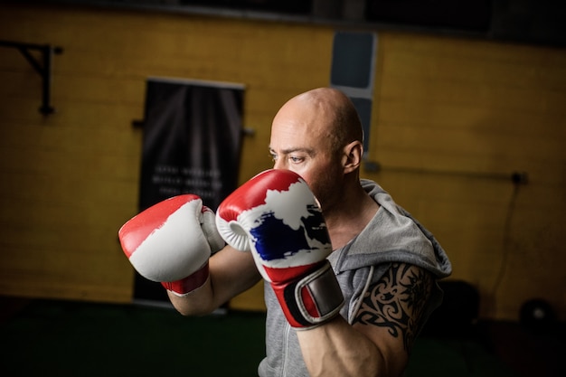 Thai boxer practicing boxing